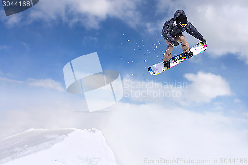 Image of Jumping snowboarder