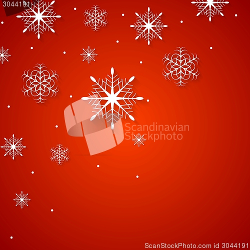 Image of White snowflakes on red background