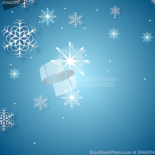 Image of White snowflakes on blue background