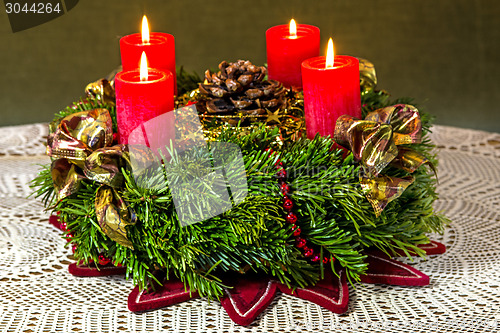 Image of Advent wreath with burning candles