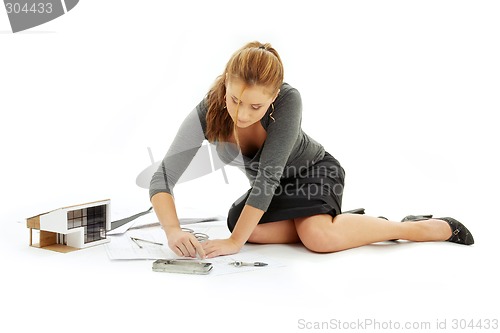 Image of architect girl with house model