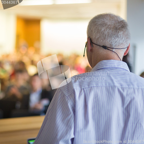 Image of Speaker at Business Conference and Presentation.