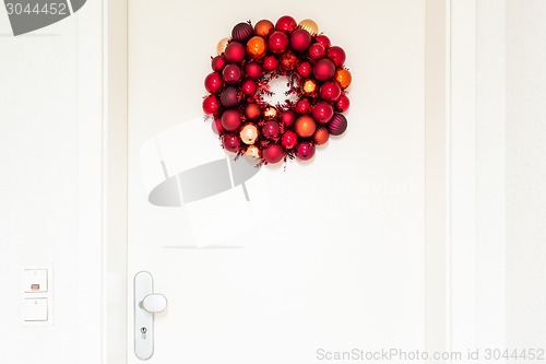 Image of Christmas wreath on entrance door