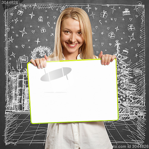 Image of Woman Looking For Christmas Gifts