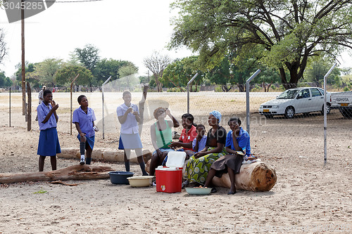 Image of Happy Namibian school children waiting for a lesson.