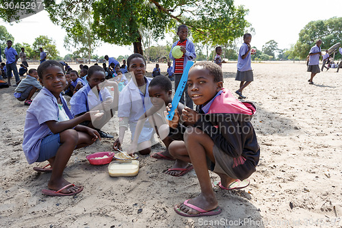 Image of Happy Namibian school children waiting for a lesson.