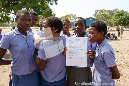 Image of Happy Namibian school children waiting for a lesson.