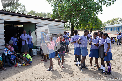 Image of Happy Namibian school children waiting for a lesson.