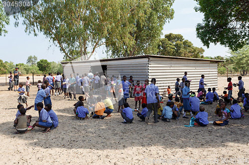 Image of Happy Namibian school children waiting for a lesson.