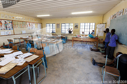 Image of Happy Namibian school children waiting for a lesson.