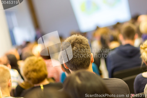 Image of Speaker at Business Conference and Presentation.