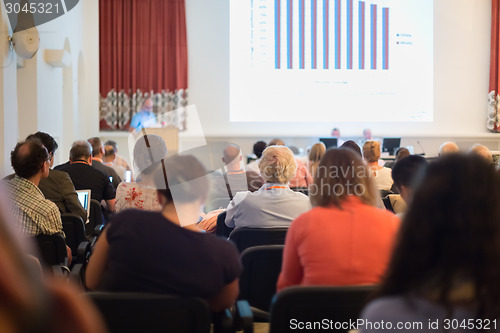 Image of Speaker at Business Conference and Presentation.