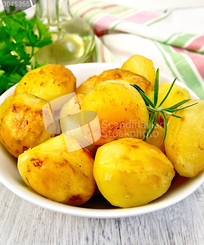 Image of Potatoes fried in plate on board