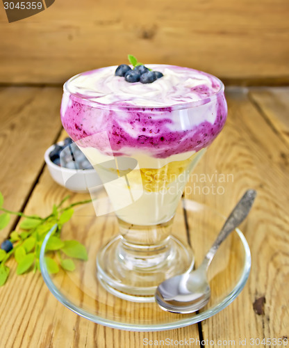 Image of Dessert milk with blueberries in glassware