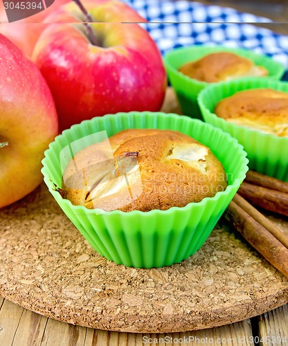 Image of Cupcake with apples on board