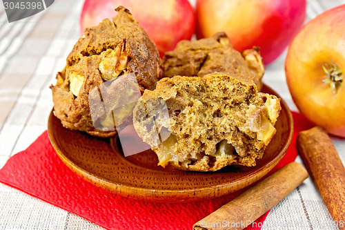 Image of Cupcakes rye with apples in wooden plate on tablecloth