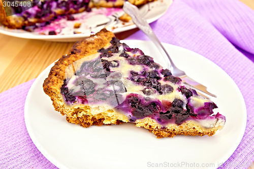 Image of Pie blueberry in plate on board