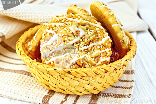 Image of Cookies with sesame and sunflower in wicker bowl