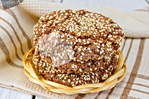 Image of Cookies chocolate in wicker plate on board