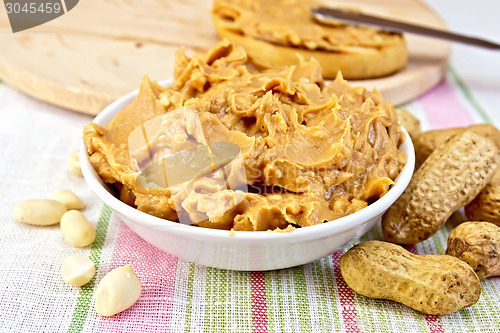 Image of Butter peanut in the bowl on tablecloth