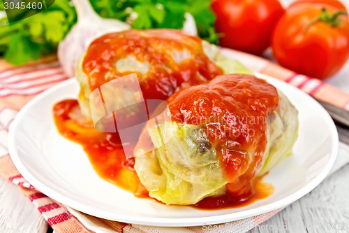 Image of Cabbage stuffed in plate on board