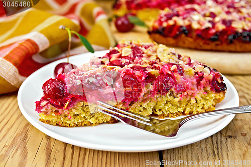 Image of Pie cherry with fork on board