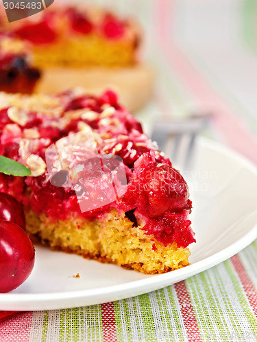 Image of Pie cherry on tablecloth