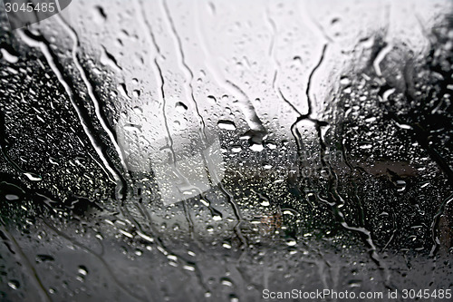 Image of Raindrops with the gray car