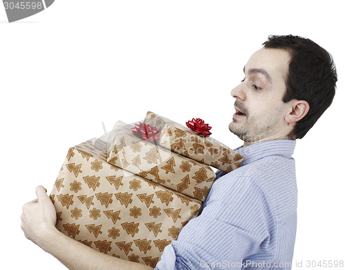 Image of Young man holding a present