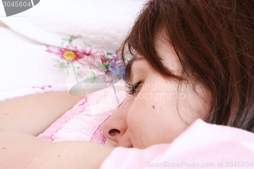 Image of Beautiful young woman sleeping.