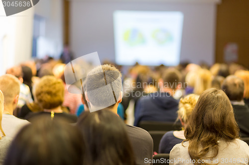 Image of Speaker at Business Conference and Presentation.