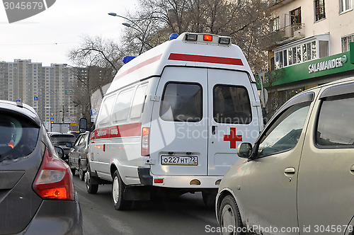 Image of The ambulance car gets stuck in a traffic jam. Tyumen, Russia