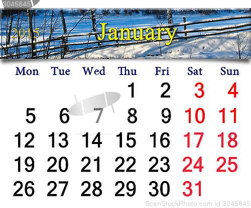 Image of calendar for January of 2015 with snowy village