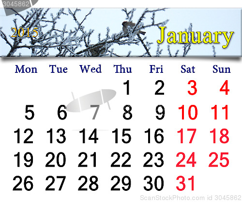 Image of calendar for January of 2015 with winter sparrows