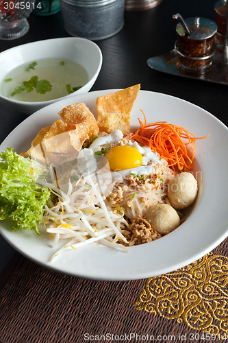 Image of Thai Noodle Dish with Fried Egg