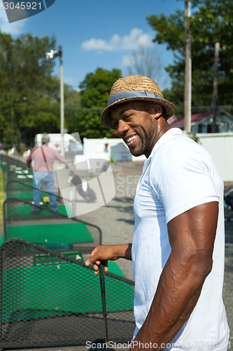 Image of Golfer at the Range