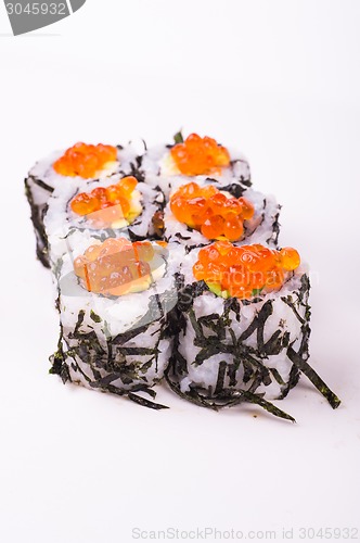 Image of sushi roll in nori with caviar