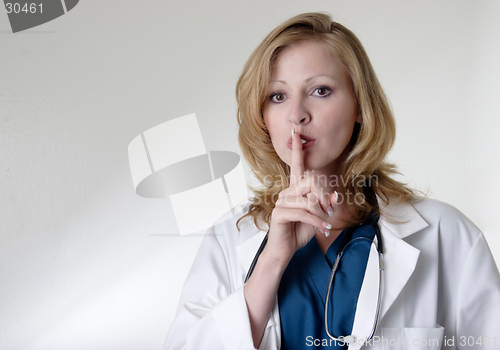 Image of lady doctor saying "shhhh"