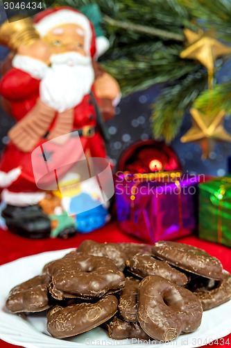 Image of Santa Claus with German Christmas cakes Lebkuchen