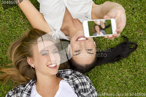 Image of Best friends taking selfies