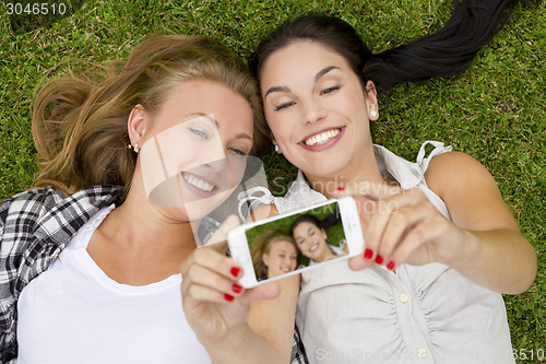 Image of Best friends taking selfies