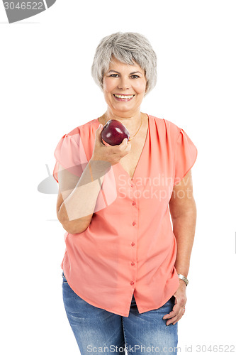 Image of Old woman eating an apple