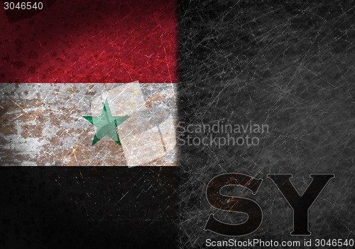 Image of Old rusty metal sign with a flag and country abbreviation