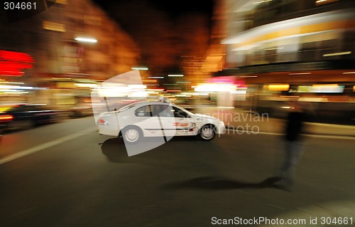 Image of taxi at night