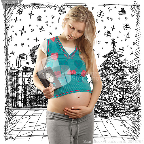 Image of Pregnant Woman Looking For Christmas Gifts