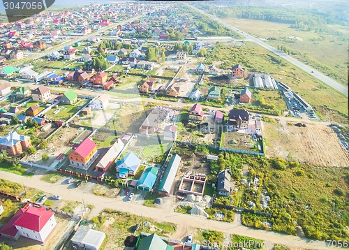 Image of Aerial view onto rural street