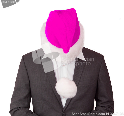 Image of Business man with a santa hat 