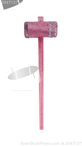 Image of Very old wooden hammer isolated, red