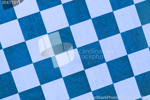 Image of Very old wooden chess board, isolated
