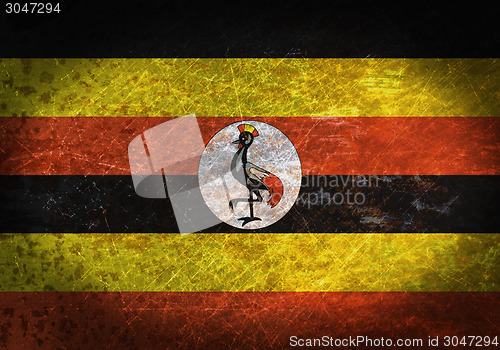 Image of Old rusty metal sign with a flag